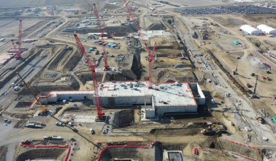 An aerial view from February 2024 shows construction progress at Intel's Ohio One campus of nearly 1,000 acres in Licking County, Ohio. Intel announced plans in January 2022, to invest more than $20 billion in the construction of two new leading-edge chip factories in Ohio. The company broke ground in September 2022. The investment will serve the needs of Intel Foundry customers as part of the company’s IDM 2.0 strategy. (Credit: Intel Corporation)