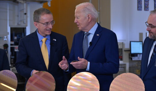Intel CEO Pat Gelsinger (left) speaks with U.S. President Joe Biden during a tour of an Intel semiconductor factory in Chandler, Arizona, on Wednesday, March 20, 2024. The tour stopped to inspect wafers representing Intel’s goal of completing five process nodes in four years. Earlier that day, the Biden-Harris Administration announced that Intel and the U.S. Department of Commerce had signed a non-binding preliminary memorandum of terms for up to $8.5 billion in direct funding to Intel for commercial semiconductor projects under the CHIPS and Science Act. (Credit: Intel Corporation)